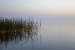 muelle del lago norte del amanecer foto