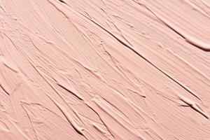 flat lay pink paint brush strokes surface photo