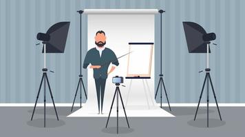 A man in a business suit with a tie is giving a presentation to the camera. The teacher is writing a lesson. The concept of blogging, online training and conferences. Camera on a tripod, softbox. vector