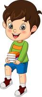 Happy cute little boy holding stack of books vector