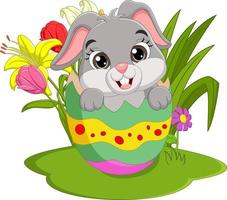 Cartoon easter bunny inside a cracked easter egg vector