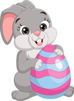 Cute Easter bunny holding decorated eggs vector