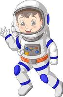 niño pequeño lindo que lleva el traje de astronauta
