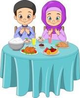 Muslim man and woman pray together before Iftar vector