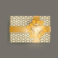 Realistic champagne color gift box with hearts pattern, gold ribbons and bow. Actual colors. Vector illustration.