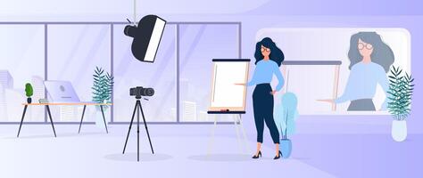 The girl is giving a presentation in front of the camera. The teacher conducts a lesson online. The concept of blogs, online training and conferences. Camera on a tripod, softbox. vector