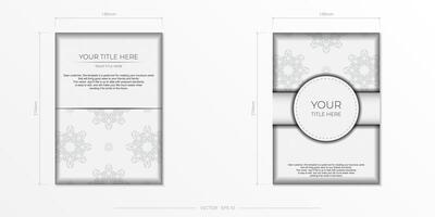 Luxurious white rectangular invitation card template with vintage indian ornaments. vector