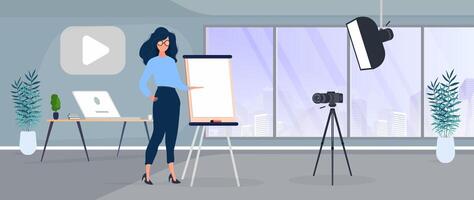 The girl is giving a presentation in front of the camera. The teacher conducts a lesson online. The concept of blogs, online training and conferences. Camera on a tripod, softbox. vector