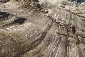 textura de piedra de las olas erosionan, fondo de naturaleza. vista superior. copie el espacio. puede usar como banner
