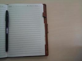 Open notebook with pages. Blank page notebook. photo