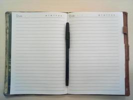 Open notebook with pages. Blank page notebook. photo