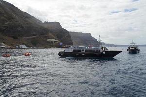 Passenger ship near the island of Santorini. photo