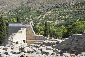 Knossos palace at Crete, Greece Knossos Palace, is the largest Bronze Age archaeological site on Crete and the ceremonial and political centre of the Minoan civilization and culture photo