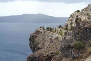 Sweeping landscape overlooking the island of Santorini, Greece photo