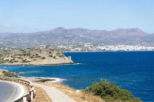 The road along the beautiful beaches on the coast of the island of Crete. photo