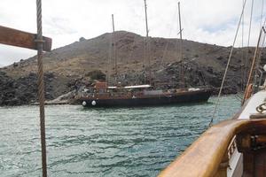 Passenger ship near the island of Santorini. photo