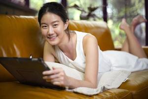asian female working at home