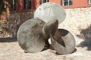 Propeller of the abandoned rusty ship photo