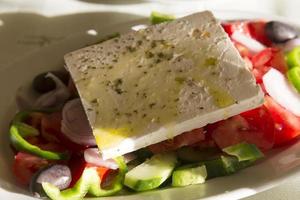 Greek salad in the cafeteria on the island of Crete. photo