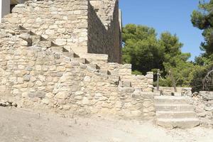 Knossos palace at Crete, Greece Knossos Palace, is the largest Bronze Age archaeological site on Crete and the ceremonial and political centre of the Minoan civilization and culture photo