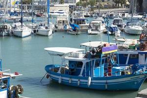 Small fishing boat on the dock. photo