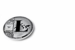 Silver colored coin Litecoins - international virtual cryptocurrency. photo