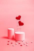 Podium with a wooden staircase and hearts in red, monochrome. Valentine's Day celebration copy space. Vertical format photo