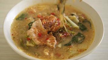 Sukiyaki Soup with Pork in Thai Style or  boiled vermicelli with pork and vegetables in sukiyaki soup - Asian food style