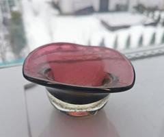 ashtray made of brown glass with air bubbles
