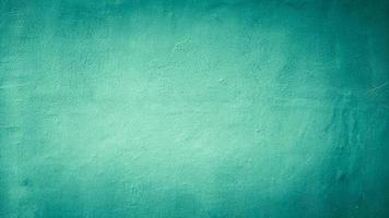 green pastel abstract cement concrete wall texture background photo