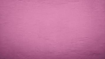 abstract cement concrete wall texture background with pink color photo