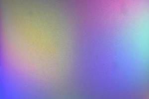 Multicolored background gradient glitter lamp close up photo