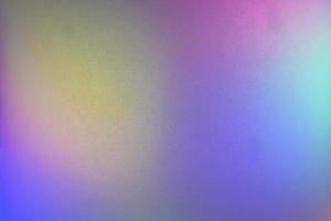 Multicolored background gradient glitter lamp close up photo