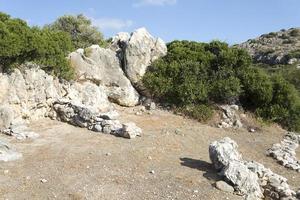 Remains of walls of buildings of the ancient people. photo