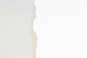 Abstract background with ripped Recycled cardboard and white textured paper. Paper texture template photo