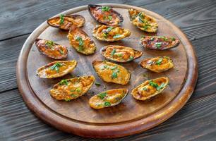 Baked mussels stuffed with cheese photo