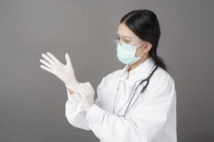 woman doctor is preparing to work with Coronavirus photo