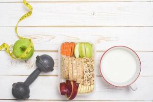 Diet food for healthy eating on white wooden  background photo