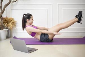 fitness woman exercise in home photo