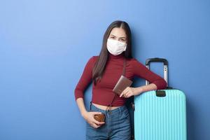 portrait of young traveler woman with face mask , New normal travel concept photo