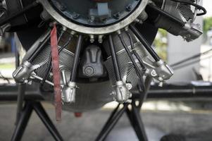 Close up of airplane engine in an airfield photo