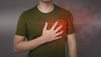 Young man With Heart Attack photo