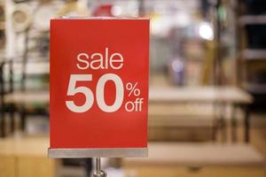 Sale 50 percent sign in shopping mall photo