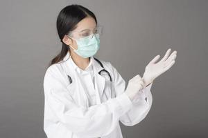 woman doctor is preparing to work with Coronavirus photo