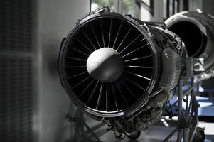Close up of airplane engine in an airfield photo
