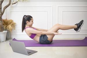 fitness woman exercise in home photo