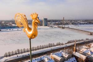 Aerial panorama view of Riga old town during beautiful winter day in Latvia. Freezing temperature in Latvia. White Riga. photo