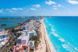 Aerial photos of luxury hotels and resorts surrounding beaches