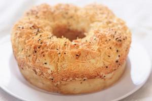 Homemade round sponge cake cheese on white table photo