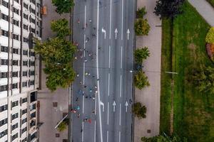 Aerial view of the people running marathon. photo